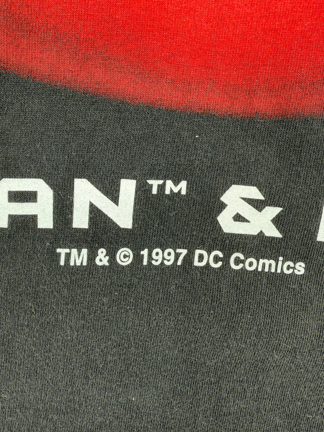Exile Vintage 1997 DC Comics Batman and Robin graphic t-shirt detail showing copyright print on black cotton fabric