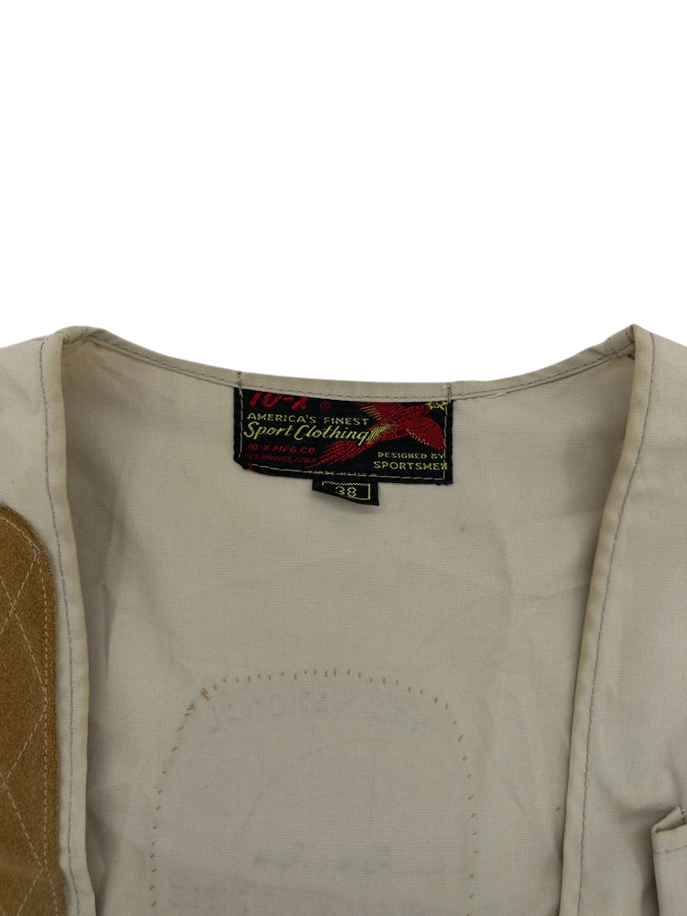 Exile Vintage 1970s 10-X Sport Clothing vest label detail on beige fabric with brown quilted shoulder patch