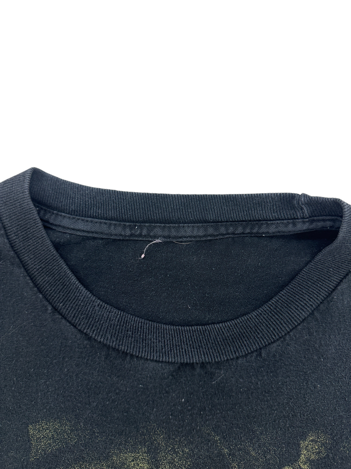 Exile Vintage 1990s Caifanes band t-shirt in black with a classic ribbed crew neck collar