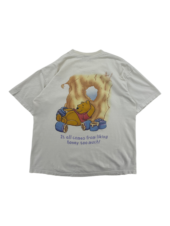Exile Vintage 1990s cream cotton t-shirt featuring a Winnie the Pooh graphic with honey pots and text on the back