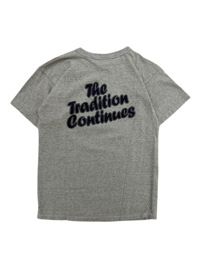 Exile Vintage grey 1980s Champion Trojan baseball t-shirt with The Tradition Continues graphic on the back