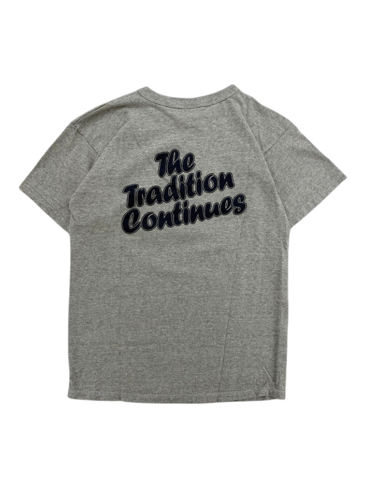 Exile Vintage grey 1980s Champion Trojan baseball t-shirt with The Tradition Continues graphic on the back