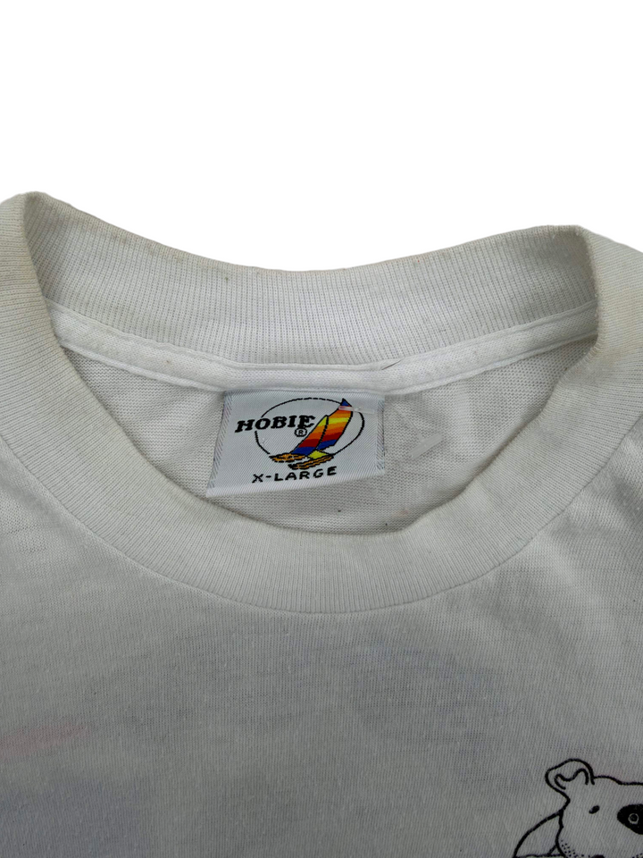 Exile Vintage white 1980s Surf Dog t-shirt with Hobie brand neck label showing size X-Large