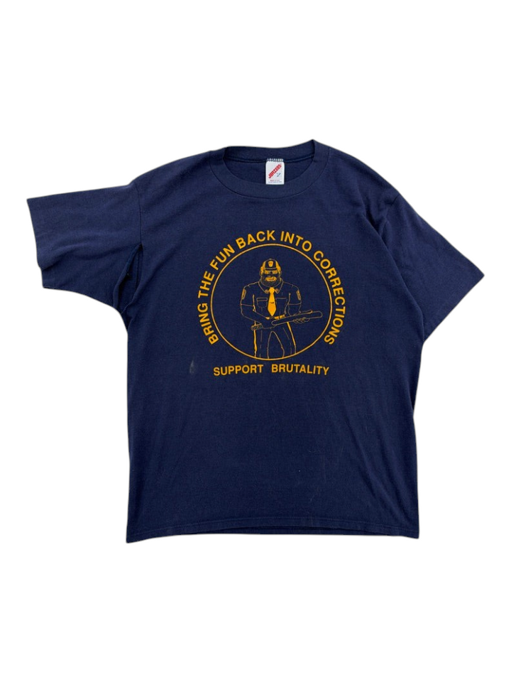 Exile Vintage 1980s navy blue graphic t-shirt with yellow print featuring a police officer and satirical text.