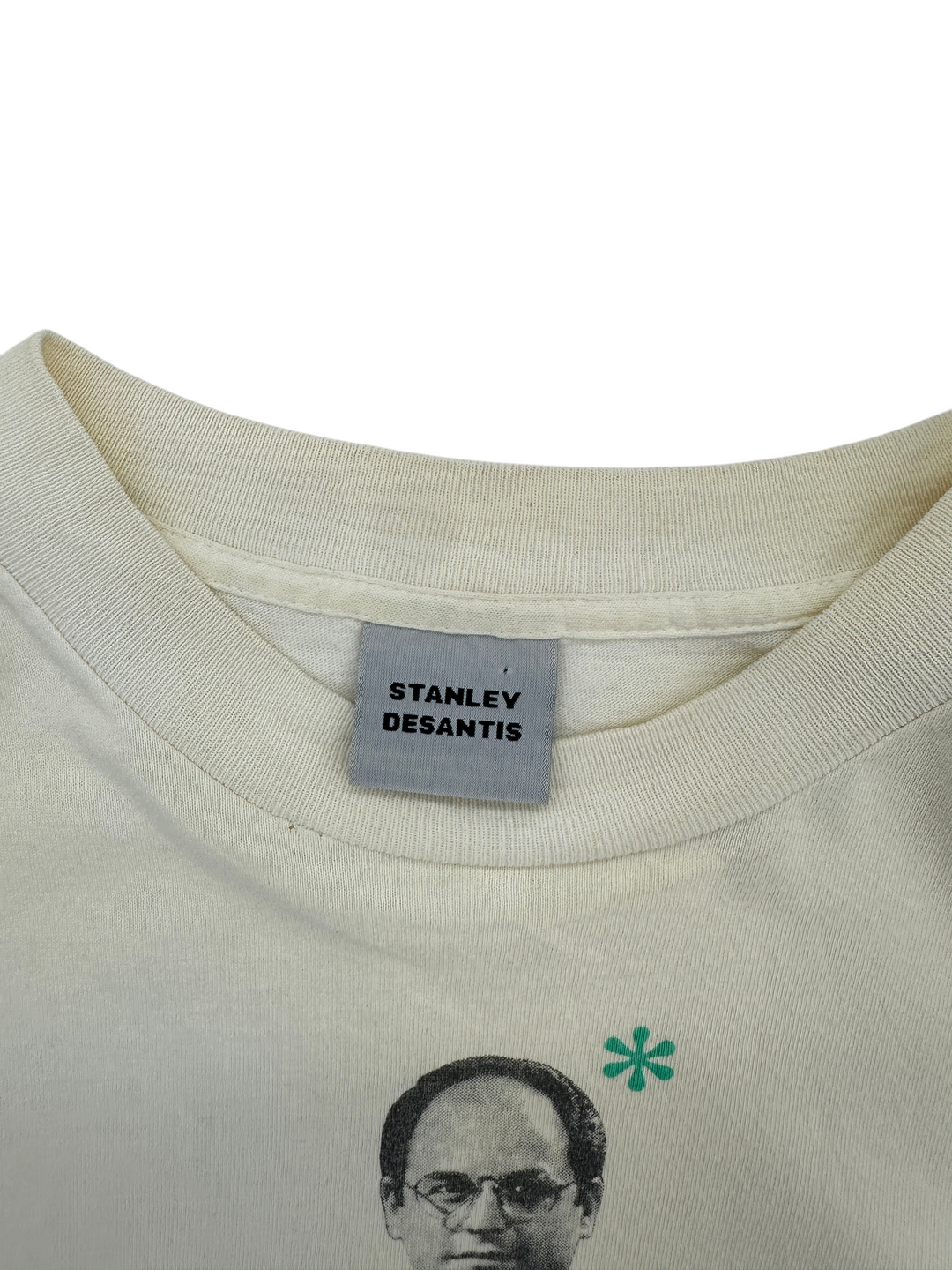 Exile Vintage 1990s Seinfeld George Costanza t-shirt with Stanley Desantis tag on cream cotton fabric