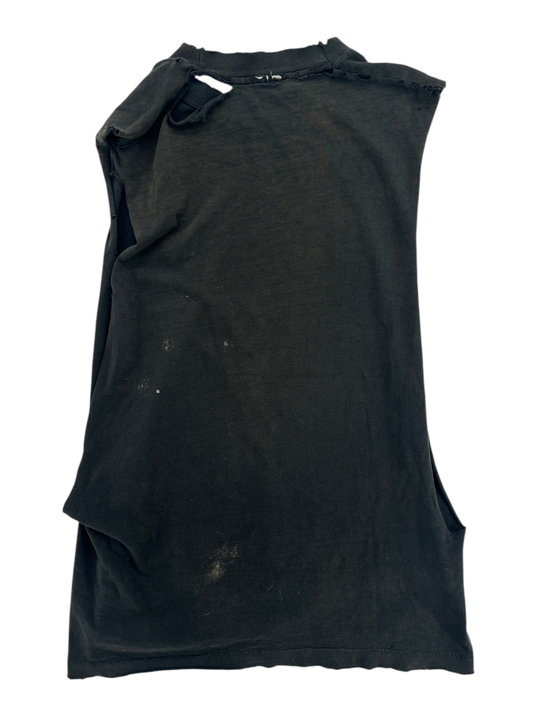 Exile Vintage 1989 Joker graphic t-shirt in black with distressed cut-off sleeves and worn-in vintage aesthetic.