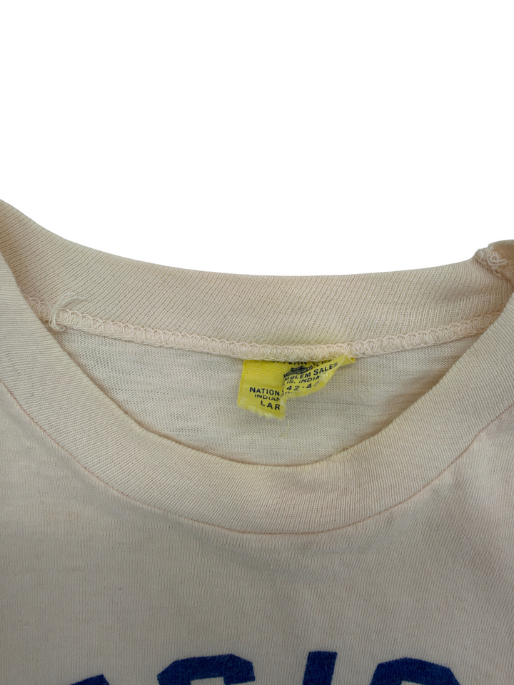 Exile Vintage 1970s Legion Boys State t-shirt collar detail with yellow size L tag on a cream cotton fabric