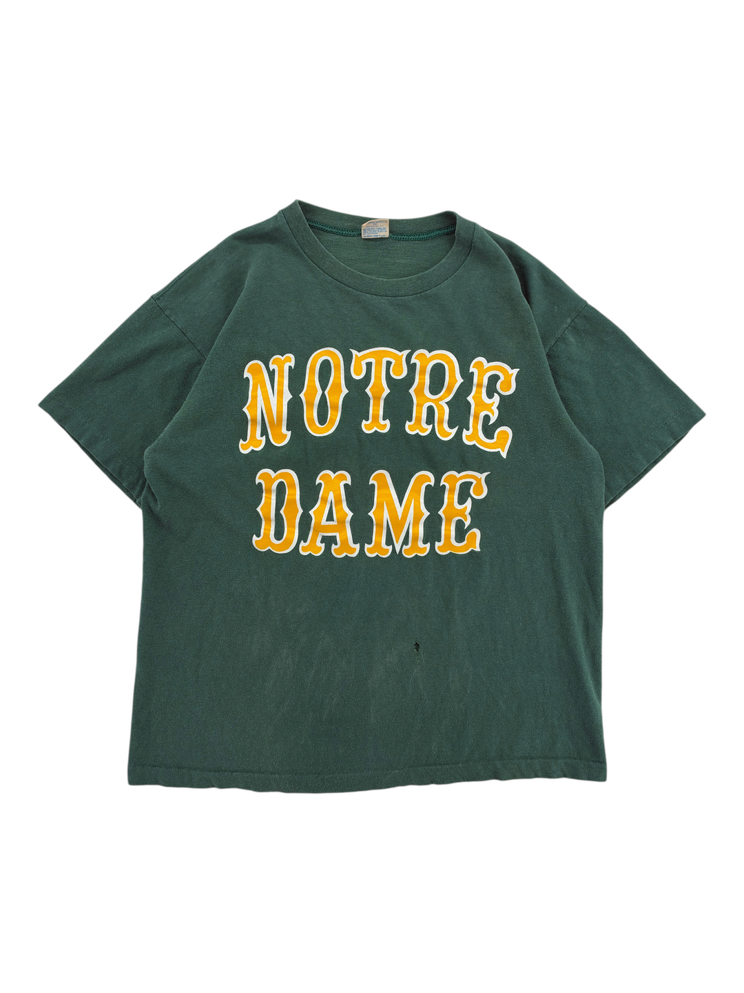 Exile Vintage 1970s green Notre Dame t-shirt with yellow and white collegiate lettering and a Champion tag