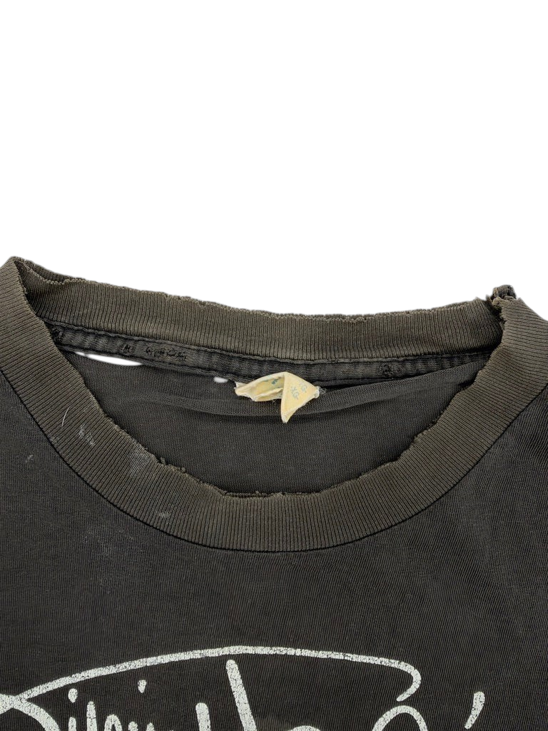 Exile Vintage 1980s Jimi Hendrix t-shirt collar detail showing distressed black fabric and original size tag