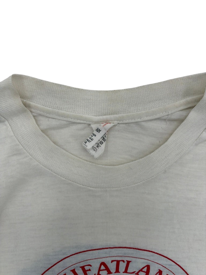 Exile Vintage 1980s Wheatland Music Festival white t-shirt collar and vintage tag detail