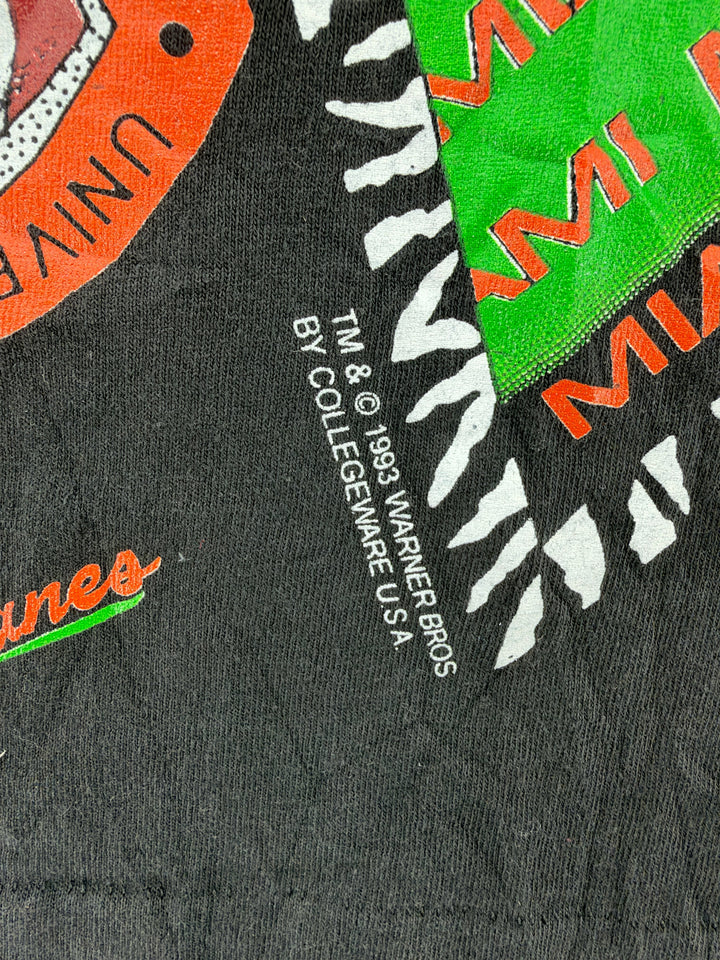 Exile Vintage 1993 Warner Bros Miami Hurricanes Taz graphic t-shirt detail showing copyright print on black cotton