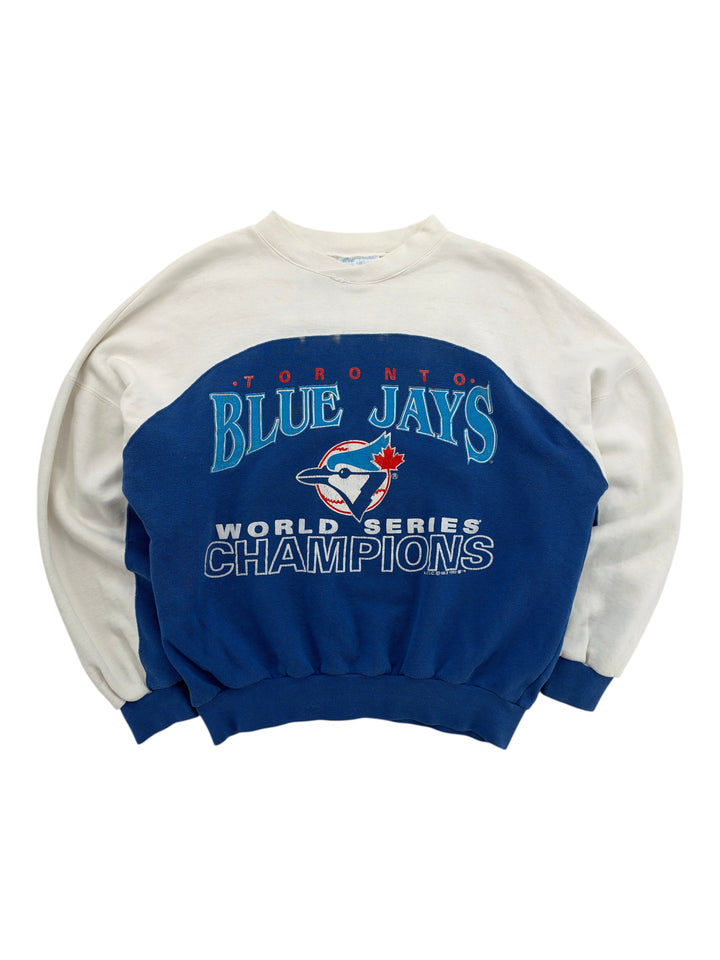 Exile Vintage 1990s Toronto Blue Jays World Series Champions crewneck sweatshirt in blue and white colorblock design.