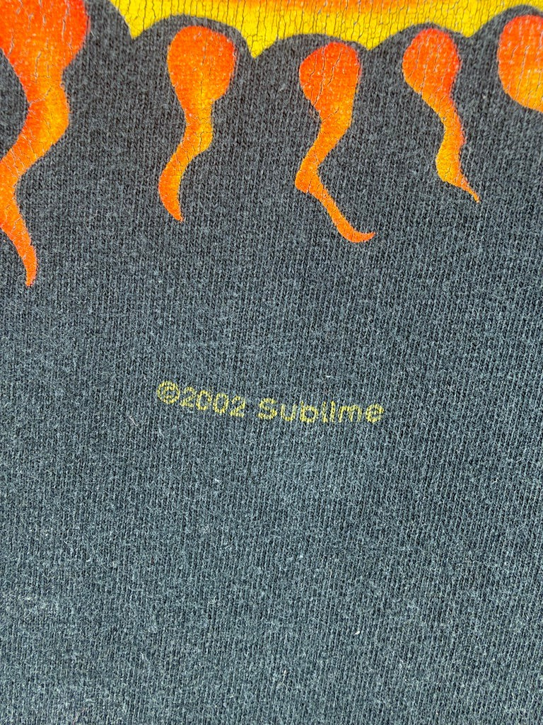 Exile Vintage 2000s Sublime band t-shirt featuring a yellow and orange sun graphic on black cotton fabric