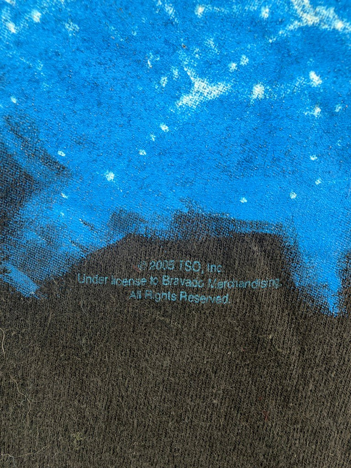 Exile Vintage 2005 Trans-Siberian Orchestra tour t-shirt copyright detail with blue graphic on black fabric