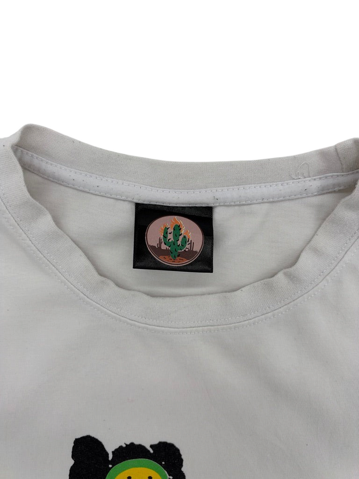 Exile Vintage Cactus Plant Flea Market white t-shirt featuring a branded cactus logo neck label