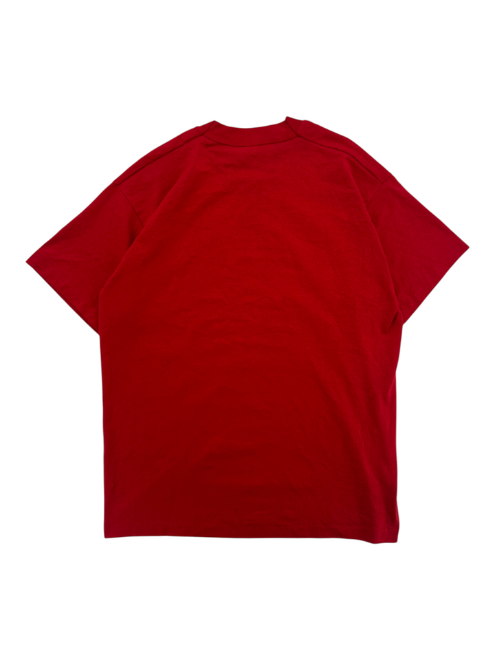 Back view of a plain red vintage 1990s Coast Guard Festival T-shirt from Exile Vintage, size large.