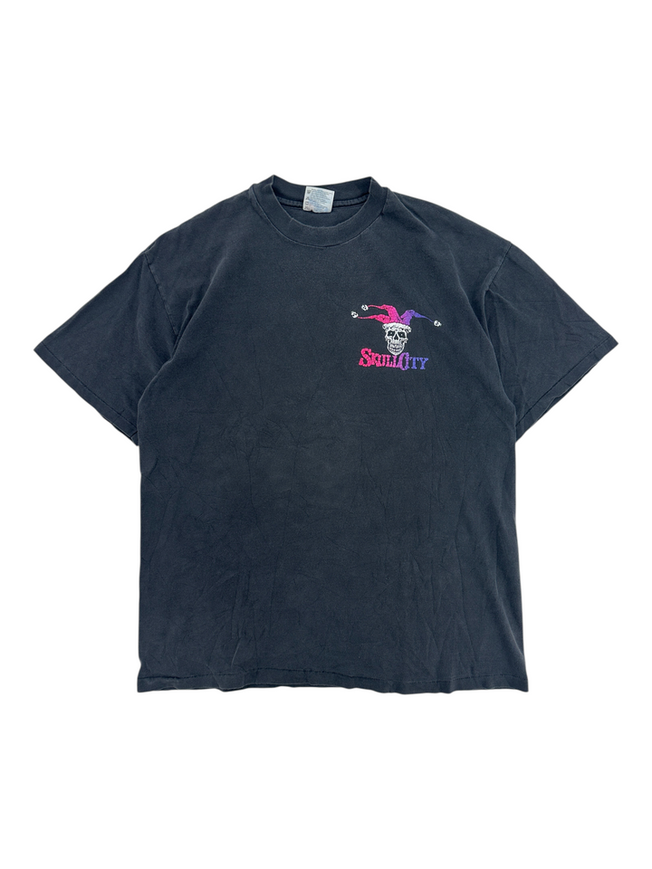 Exile Vintage 1990s black cotton t-shirt featuring a small colourful jester skull graphic on the chest