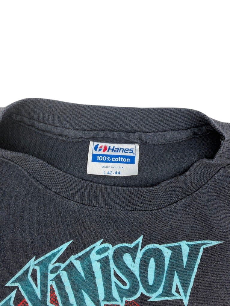 Exile Vintage 1980s Sam Kinison T-shirt featuring a Hanes 100% cotton tag on a faded black crewneck collar