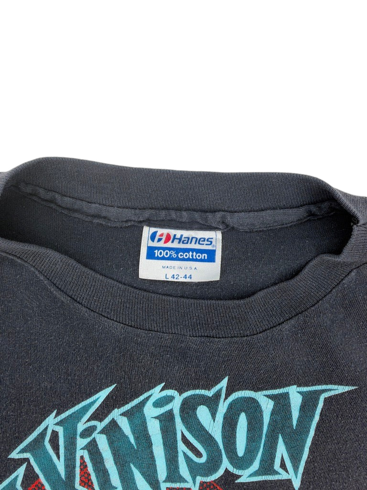 Exile Vintage 1980s Sam Kinison T-shirt featuring a Hanes 100% cotton tag on a faded black crewneck collar
