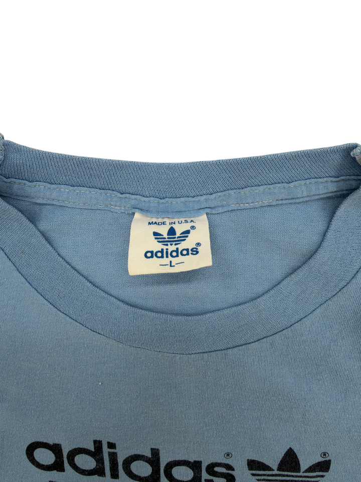 Exile Vintage light blue 1980s Adidas t-shirt with Made in U.S.A. tag and trefoil logo