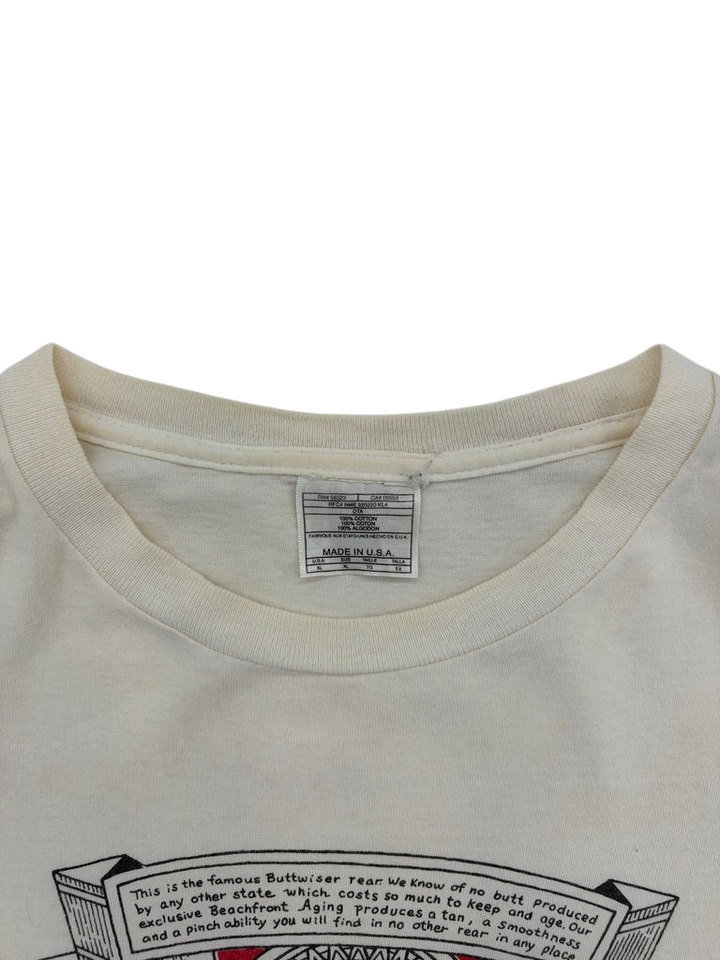 Exile Vintage 1990s Buttwiser humour t-shirt collar and interior size label showing 100 percent cotton material