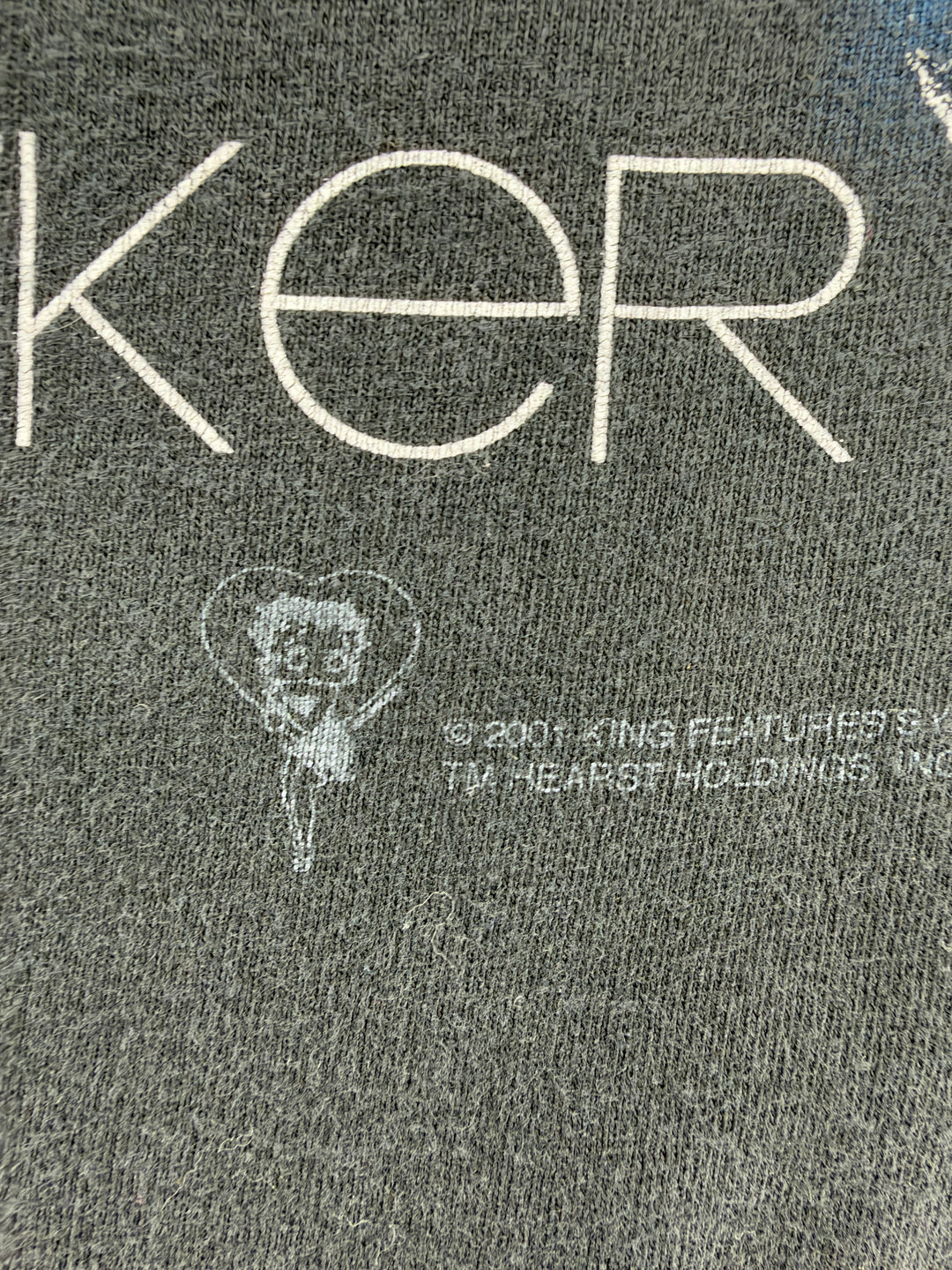 Exile Vintage 2000s Betty Boop biker t-shirt detail showing the 2001 copyright print on black cotton fabric