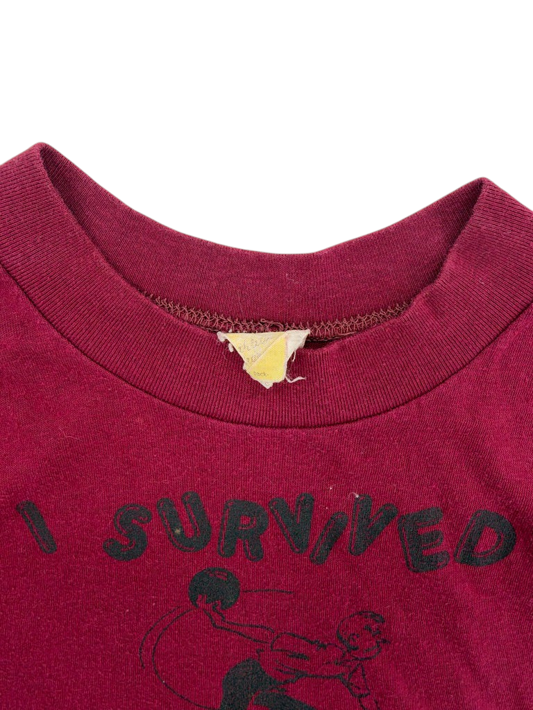 Exile Vintage 1980s maroon graphic t-shirt with I Survived bowling print and crew neckline