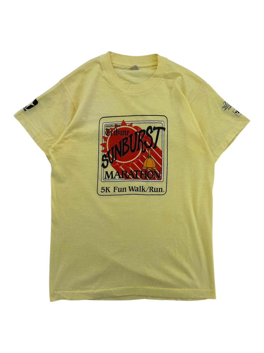 Exile Vintage yellow 1980s Sunburst Marathon 5K graphic t-shirt with short sleeves and vintage screen print design