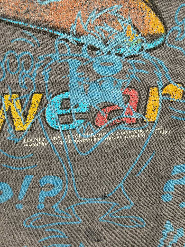 Exile Vintage 1990s Taz Toonatic graphic t-shirt with distressed all-over print and Looney Tunes branding