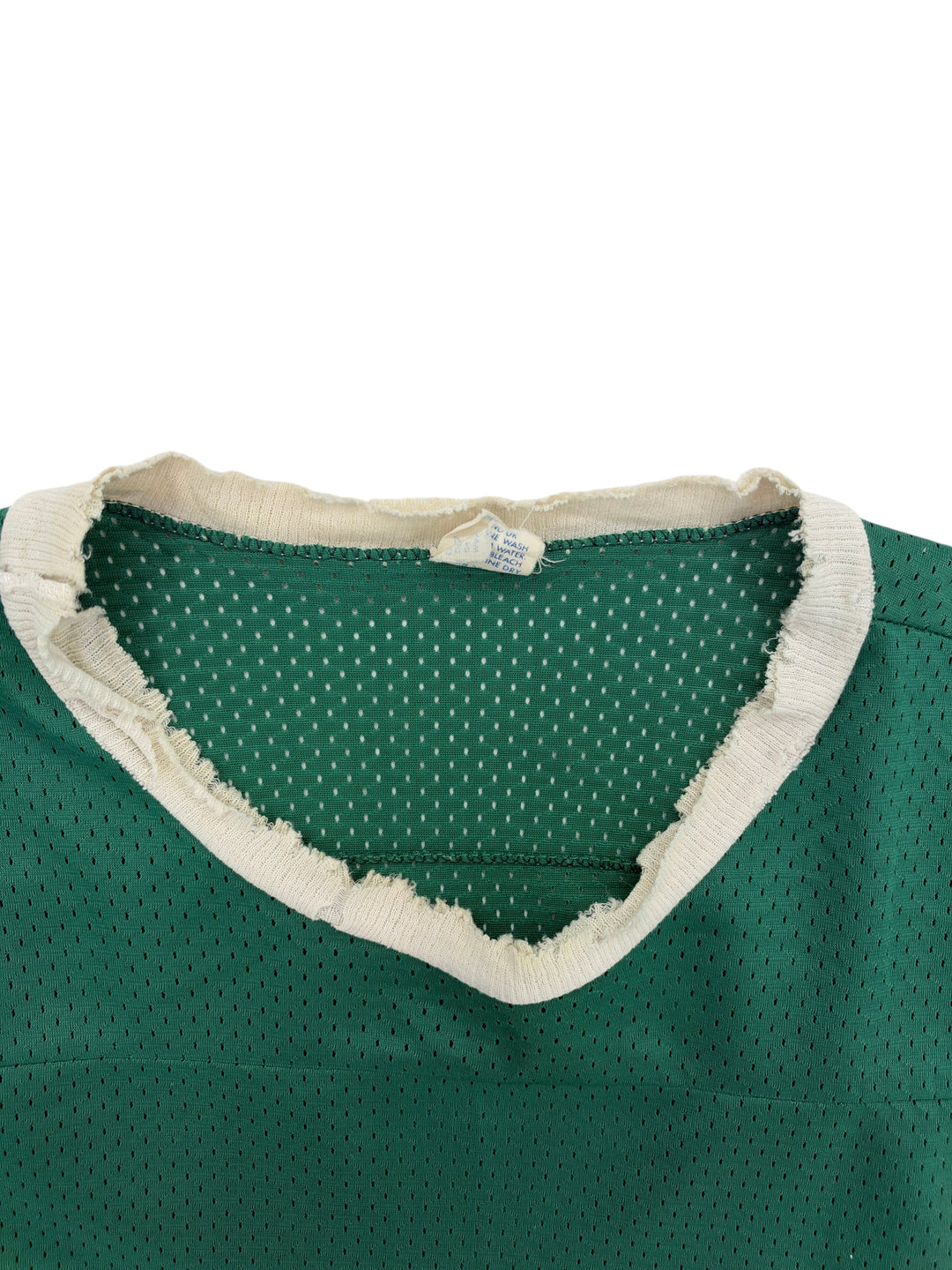 Exile Vintage 1980s Michigan State green mesh football jersey with a distressed white ribbed crew neck collar