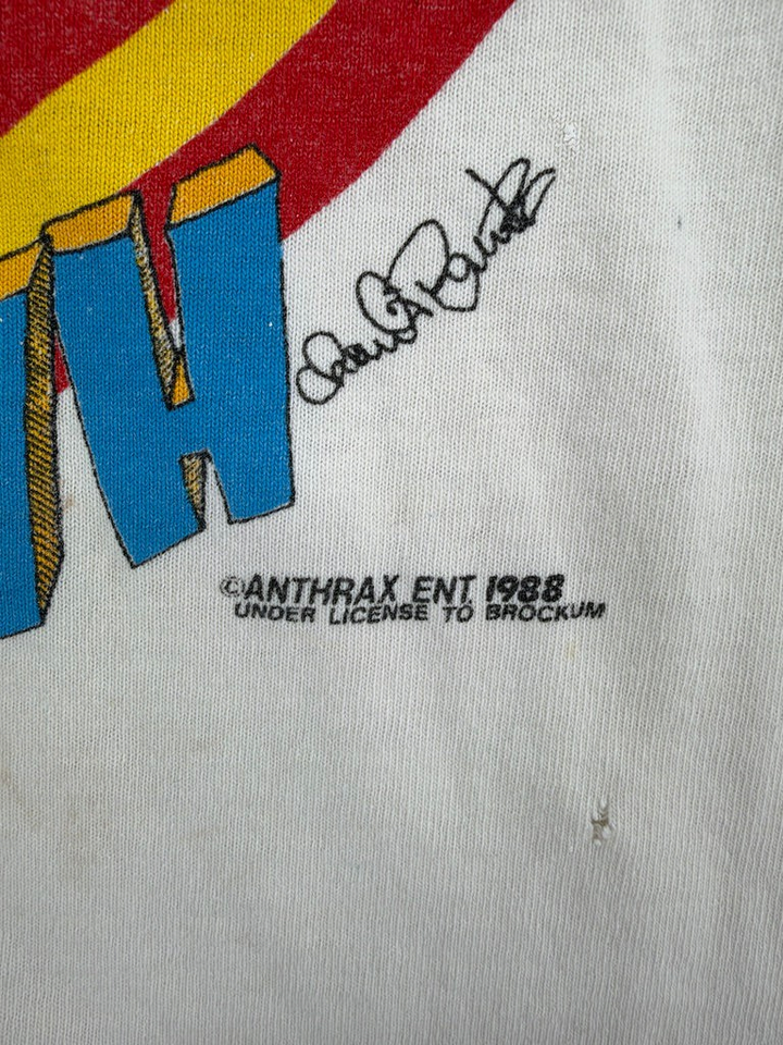 Exile Vintage 1980s Anthrax State of Euphoria band t-shirt detail with 1988 copyright print and small fabric holes.