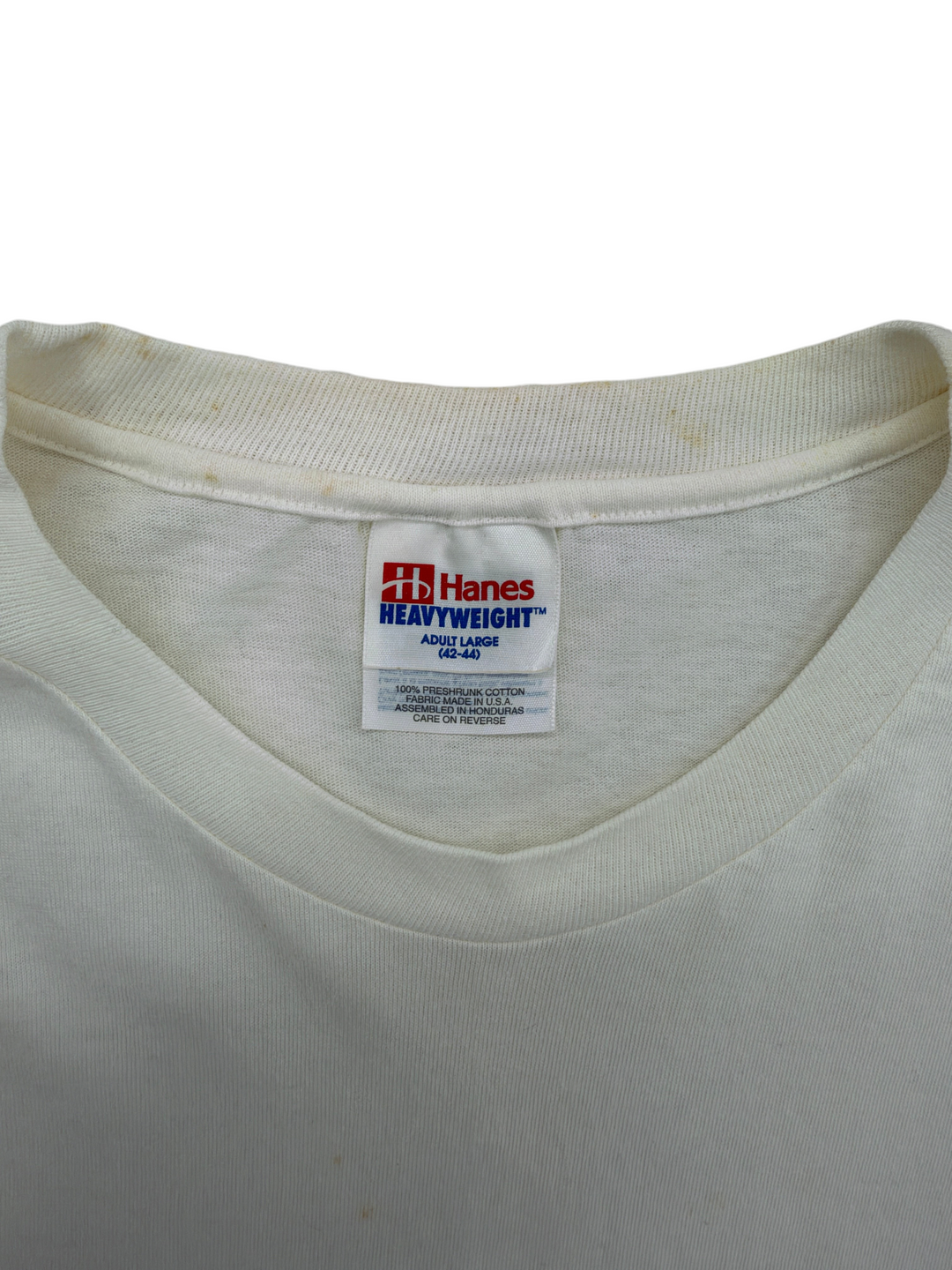 Exile Vintage white 1990s Hanes Heavyweight cotton T-shirt tag showing size large and made in USA label