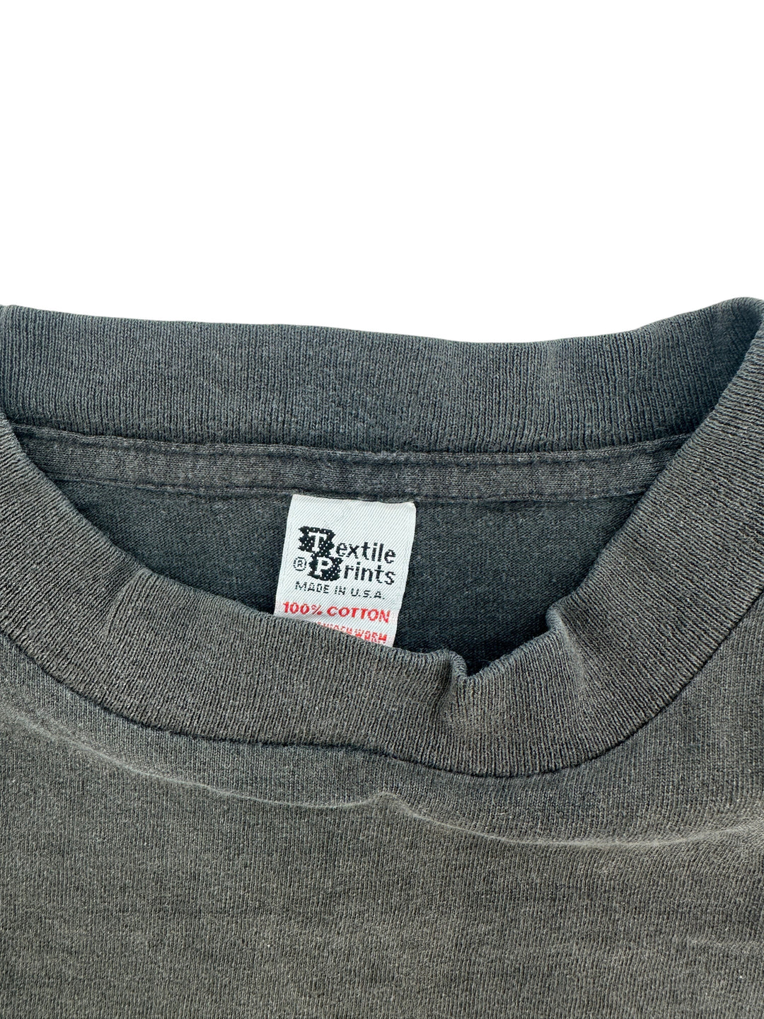 Exile Vintage 1980s Bahamas Fish T-shirt collar detail showing Textile Prints brand label and cotton fabric texture