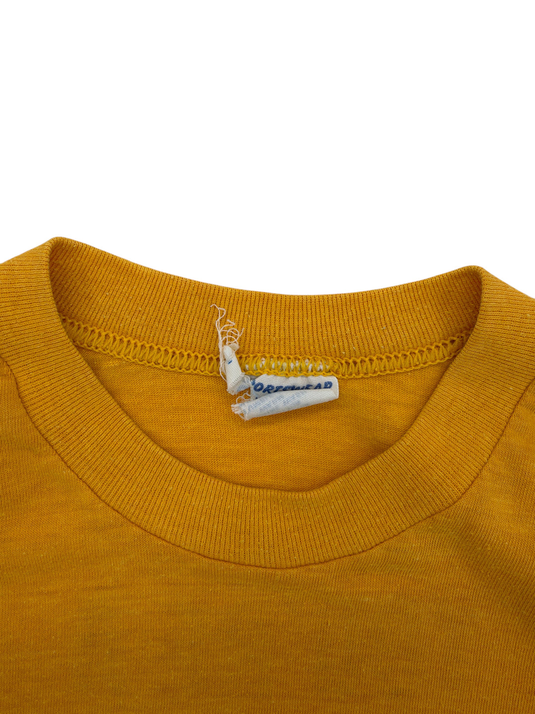 Exile Vintage mustard yellow 1980s crew neck t-shirt collar detail with worn clothing tag