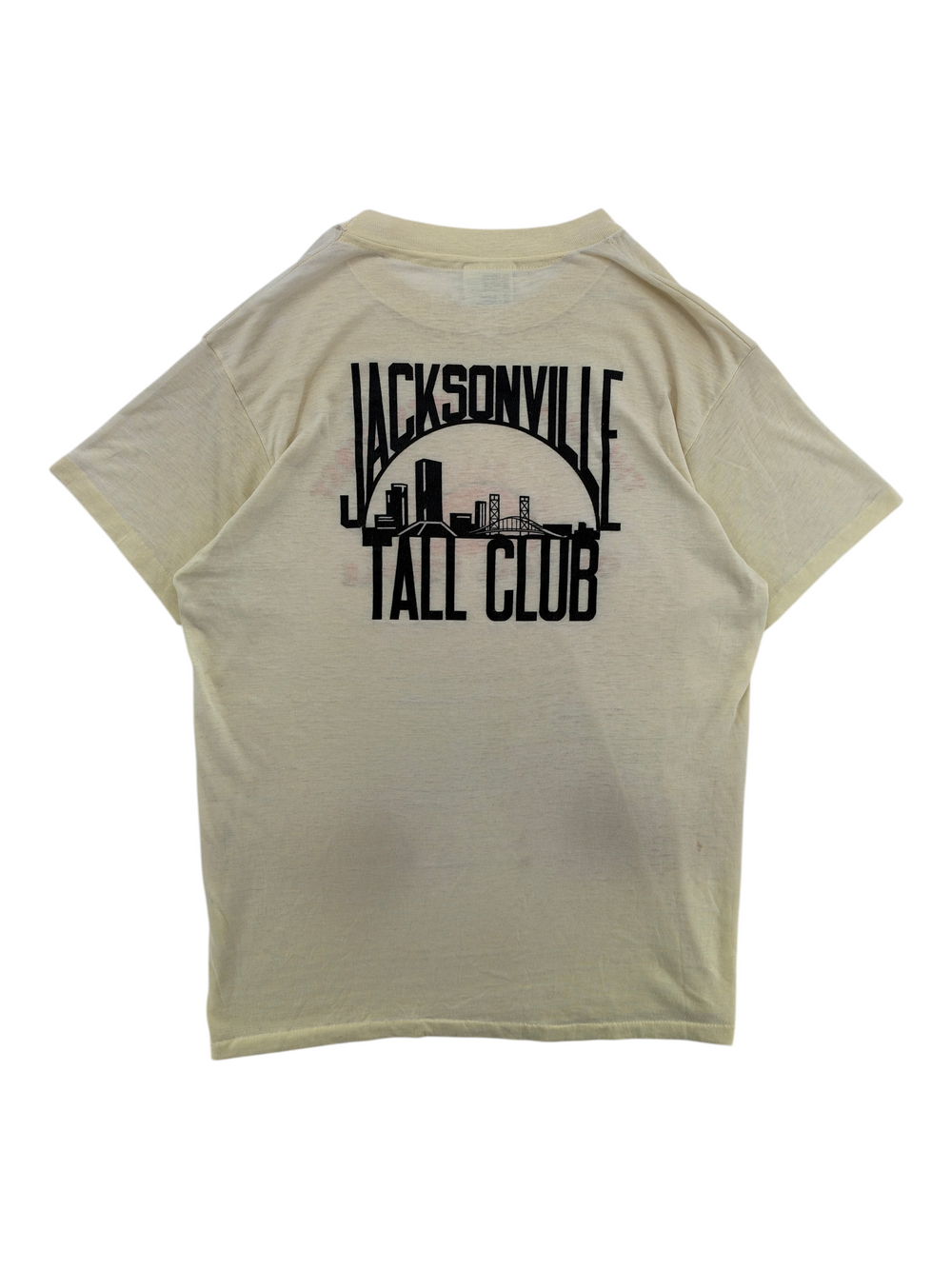 Exile Vintage 1980s cream graphic t-shirt with black Jacksonville Tall Club skyline print on the back