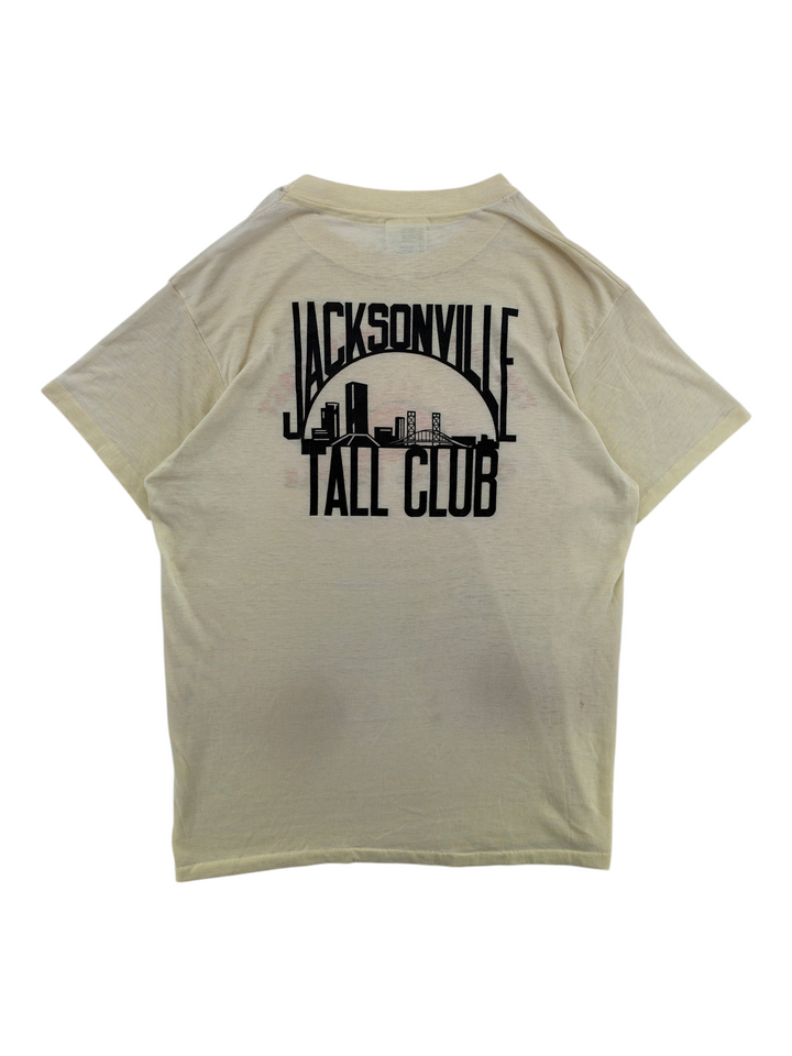 Exile Vintage 1980s cream graphic t-shirt with black Jacksonville Tall Club skyline print on the back