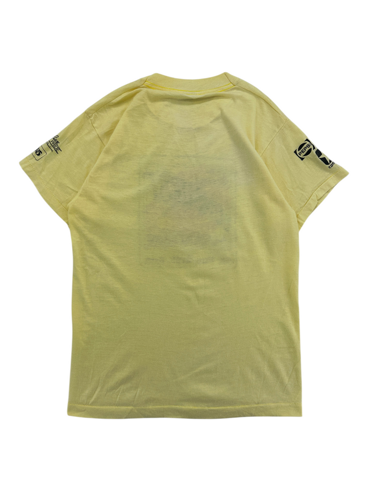 Back view of a vintage yellow Exile Vintage 1980s Sunburst Marathon 5K T-shirt with Pepsi branding on the sleeve.