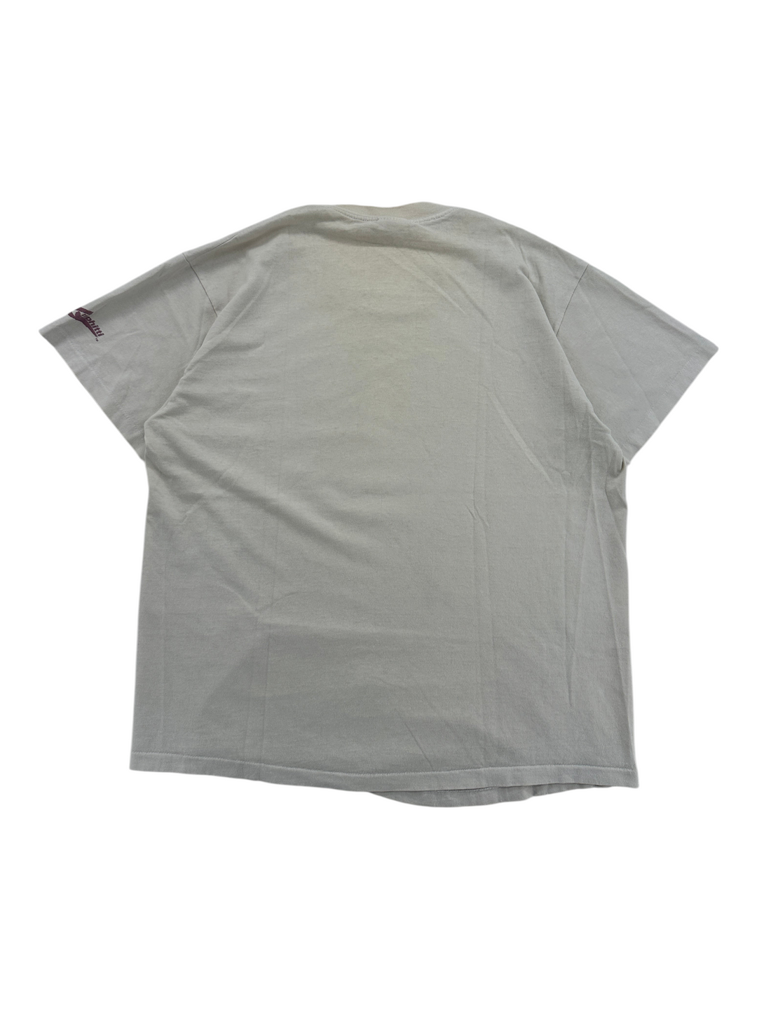 Back view of a vintage Exile Vintage 1989 Dave Stevens Bettie Page t-shirt in off-white with a small sleeve logo