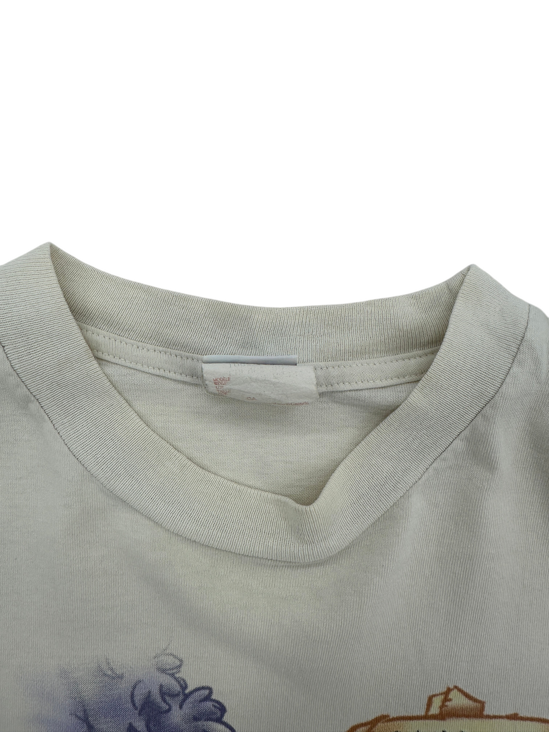 Exile Vintage 1990s Winnie The Pooh t-shirt featuring a ribbed crew neck collar and faded interior size tag