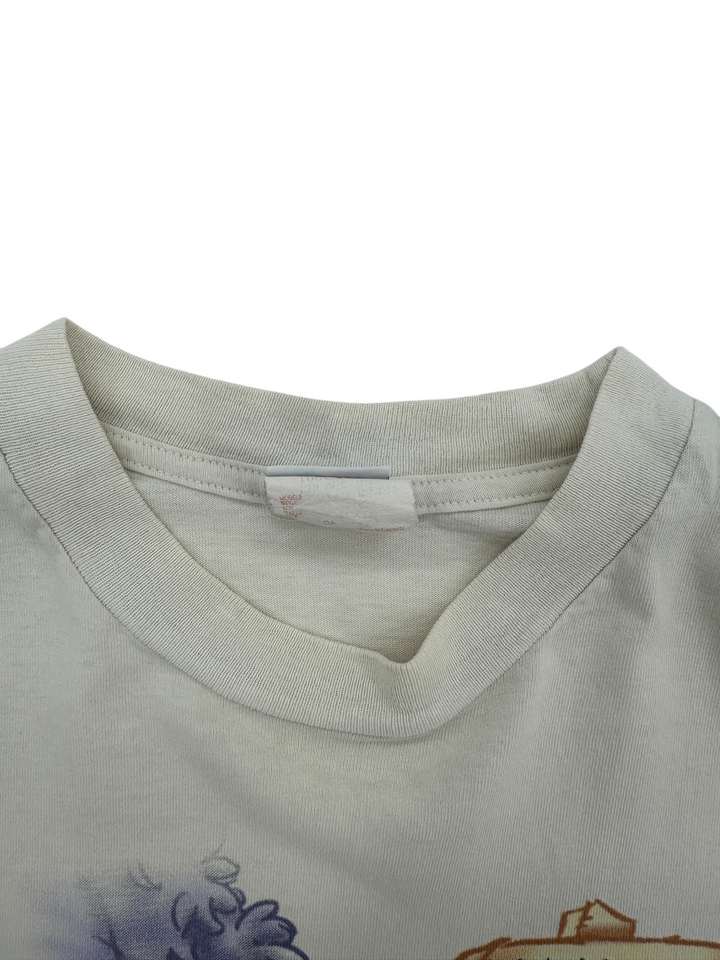 Exile Vintage 1990s Winnie The Pooh t-shirt featuring a ribbed crew neck collar and faded interior size tag