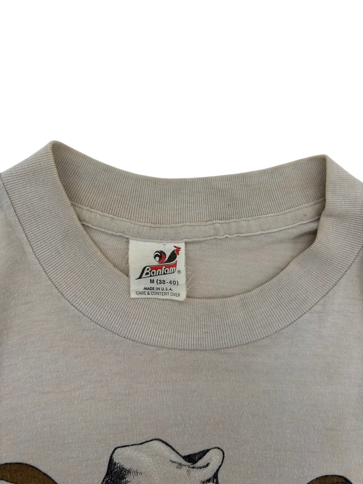 Exile Vintage 1980s beige cotton t-shirt with Banfam brand label and crew neck collar