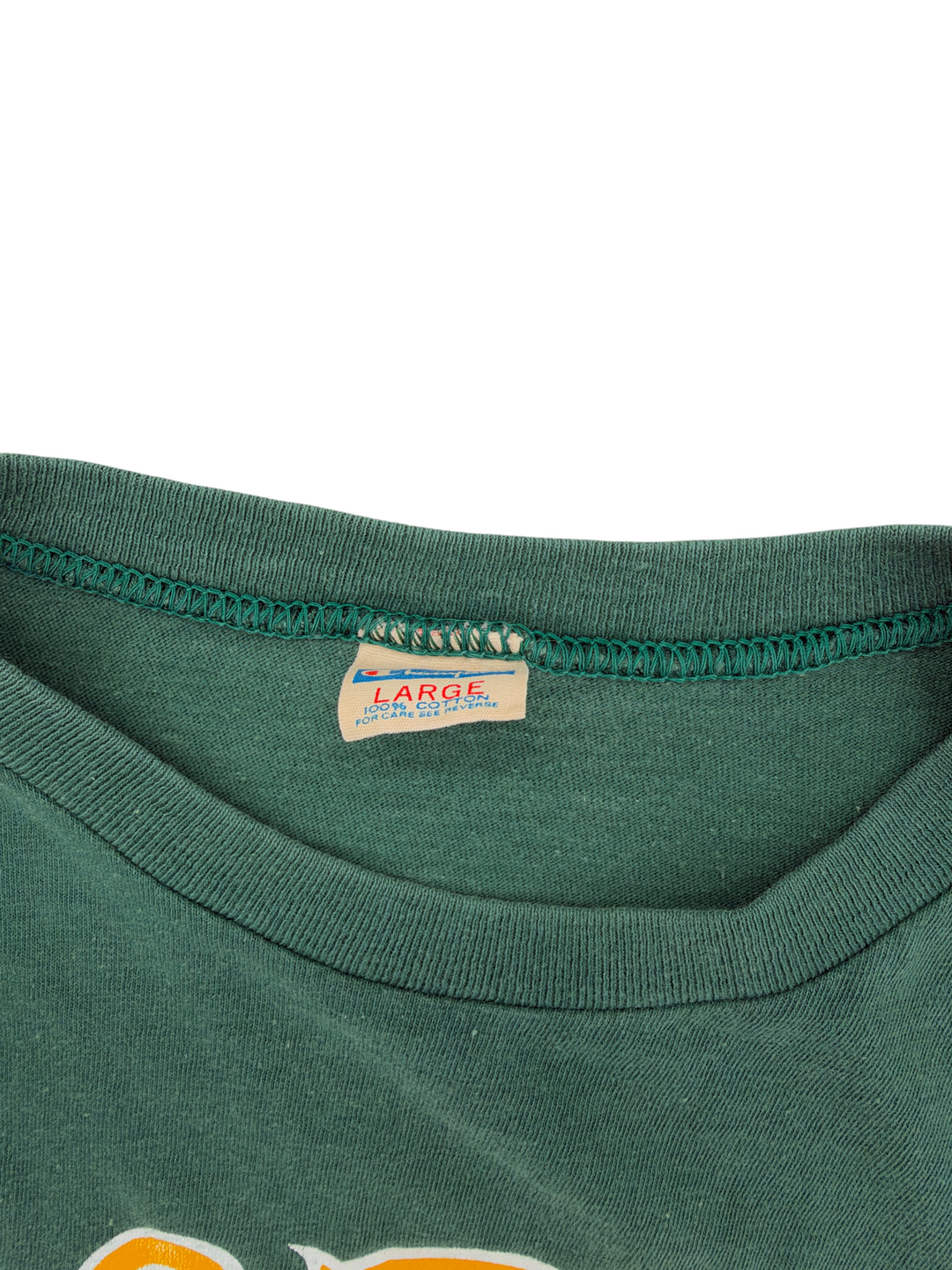 Exile Vintage 1970s green cotton t-shirt featuring a vintage Champion brand tag and size large label