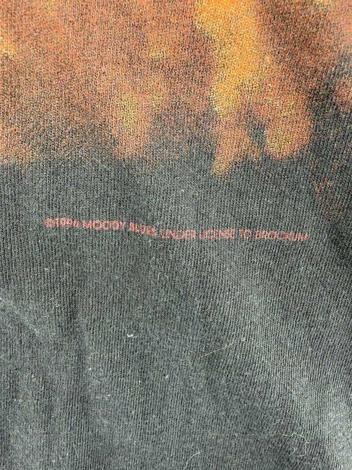 Exile Vintage 1990s The Moody Blues tour t-shirt detail showing the vintage copyright print on black cotton fabric