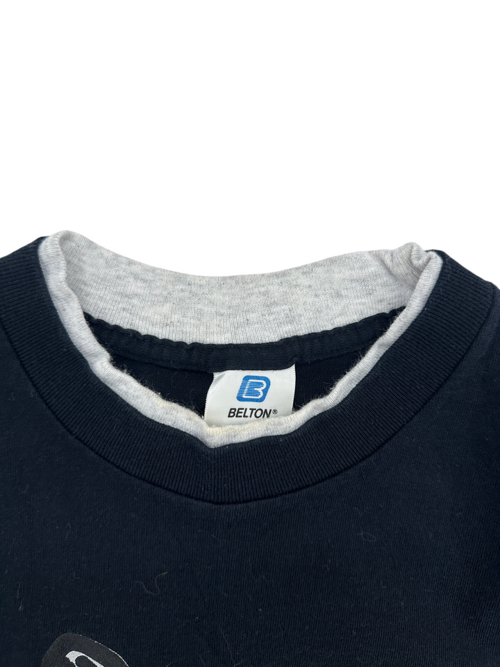 Exile Vintage 1990s Indian Valley Warriors t-shirt featuring a grey ribbed collar and Belton brand tag