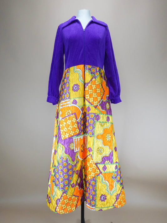 Mannequin wearing a purple top and colorful floral dress against a neutral background