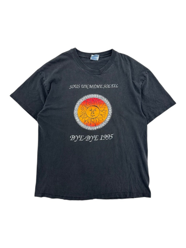 Exile Vintage 1990s black cotton t-shirt featuring a circular sun graphic and Sous Un Meme Soleil Bye-Bye text