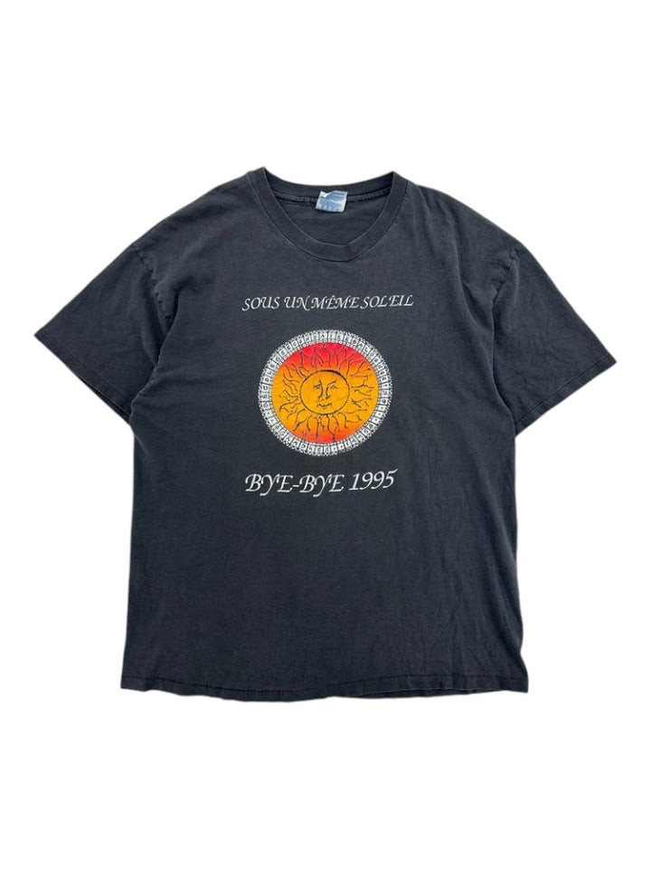 Exile Vintage 1990s black cotton t-shirt featuring a circular sun graphic and Sous Un Meme Soleil Bye-Bye text