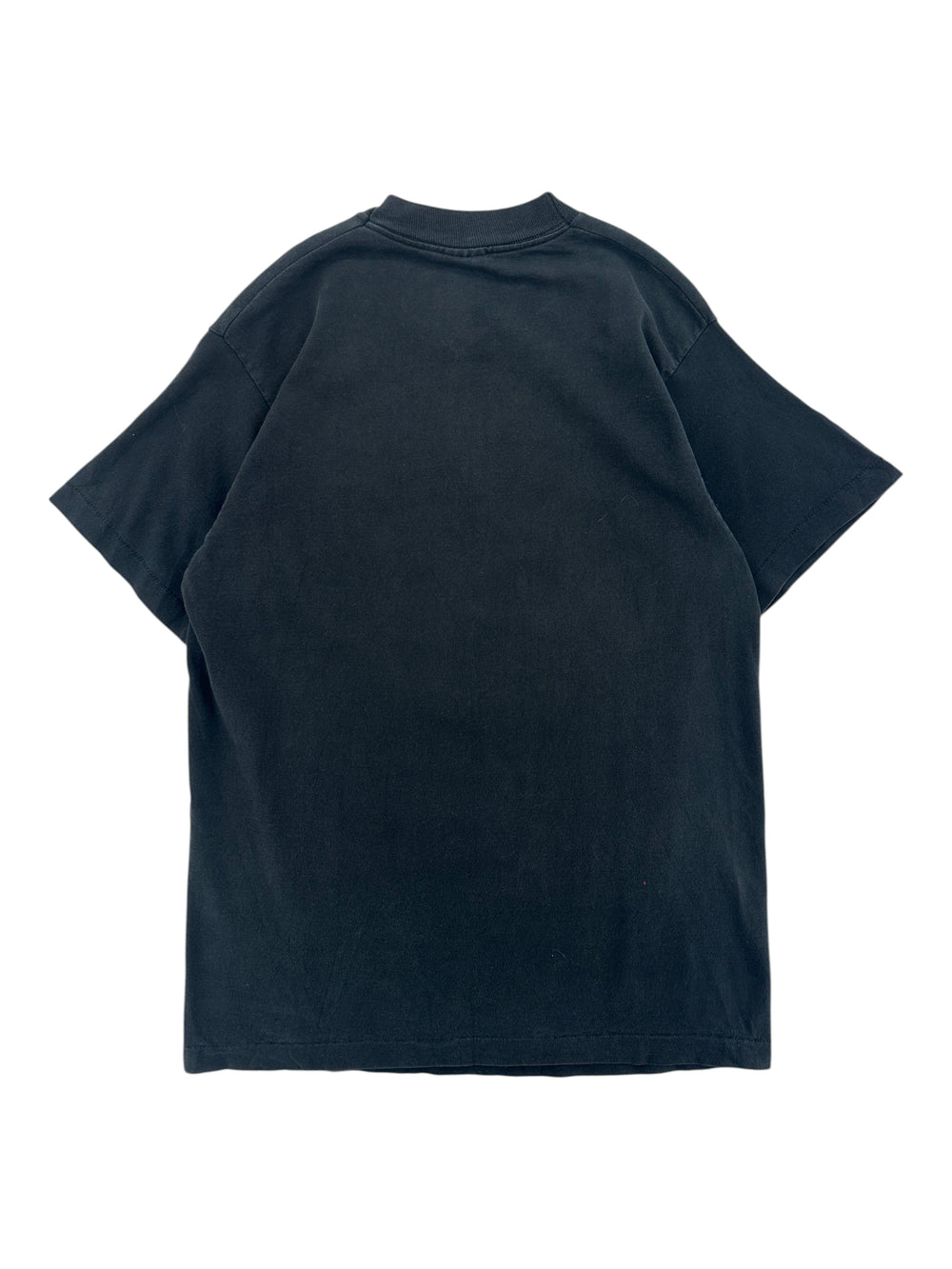 Back view of a vintage black Exile Vintage 1990s Green Bay Packers cotton t-shirt in size medium.