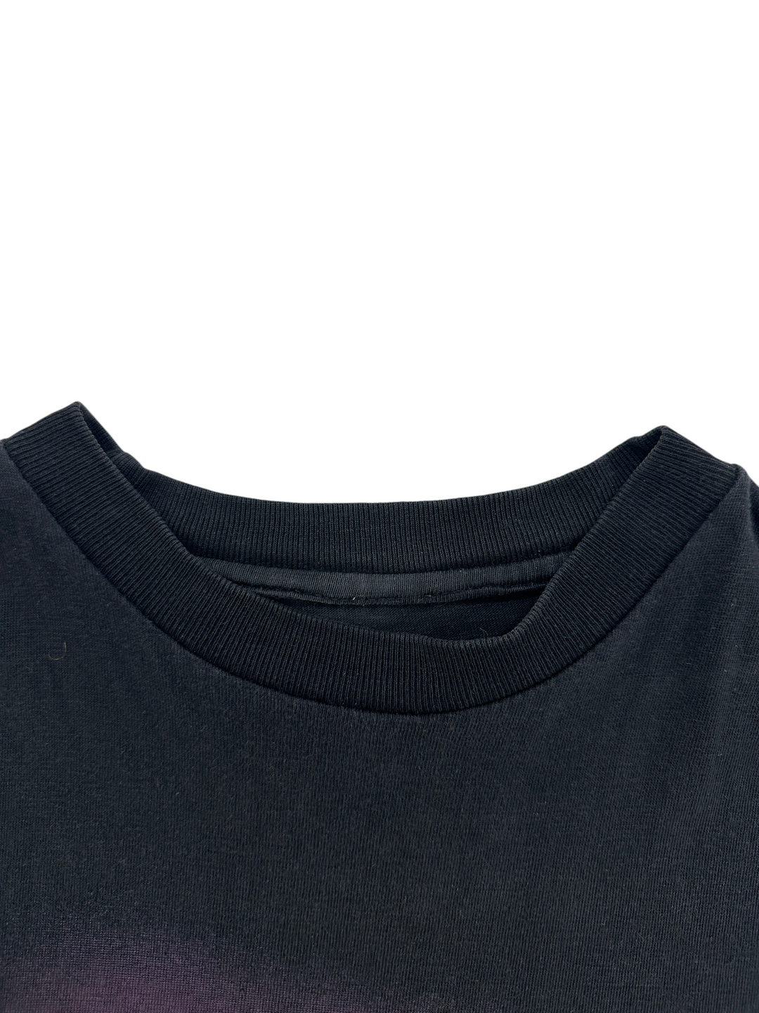 Exile Vintage black sleeveless t-shirt featuring a ribbed crew neckline, shown in a close-up detail view.
