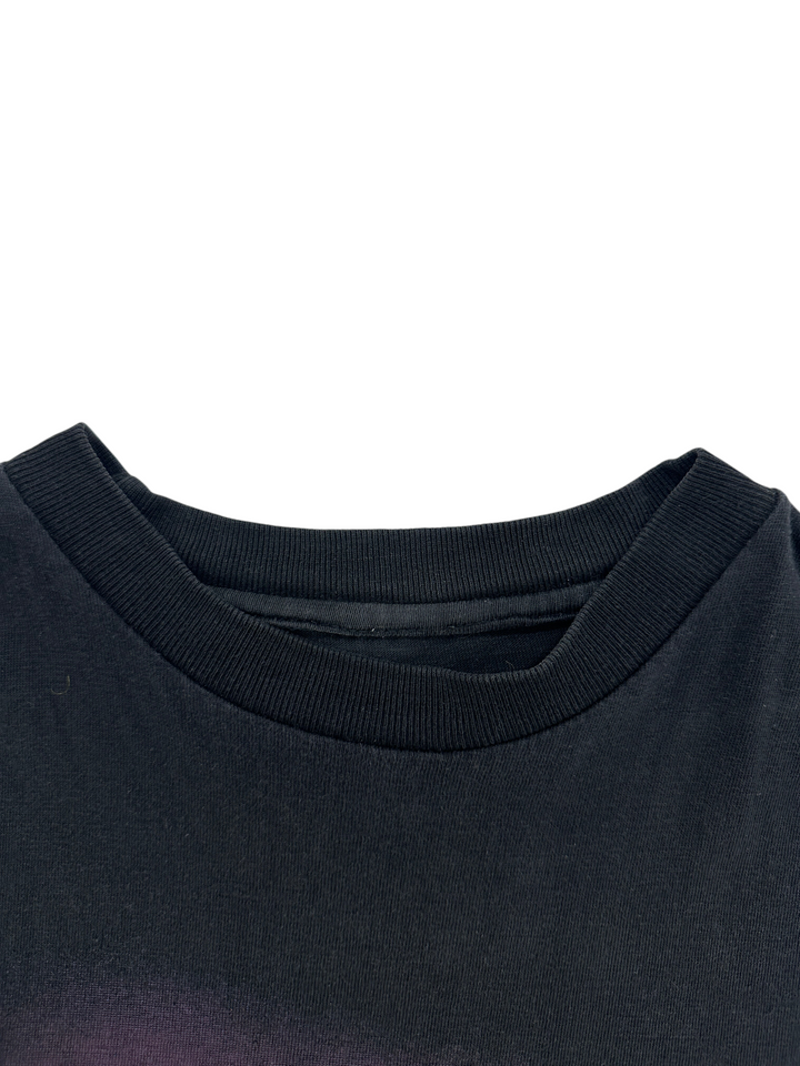 Exile Vintage black sleeveless t-shirt featuring a ribbed crew neckline, shown in a close-up detail view.